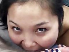 Asian Lucy swallowing a cock in this POV scene